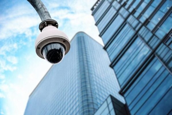 security-camera-with-glass-building-background_657883-231